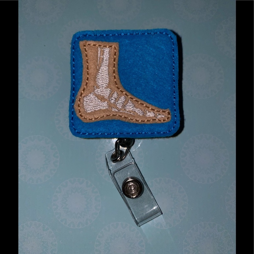 $8/1 OR BUNDLE 3/$18 X-Ray Foot Badge Reel!